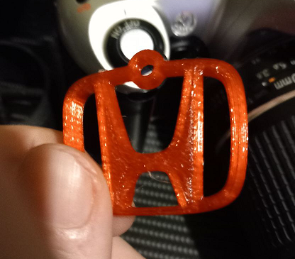 Llavero de Honda realizado con impresión 3D, impreso con PETG Candy Red.